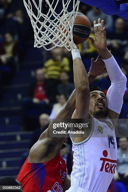 Kyle Hines of CSKA Moscow vies with Gustavo Ayón of Real Madrid during the Turkish Airlines Euroleague Top 16 match between CSKA Moscow and Real...