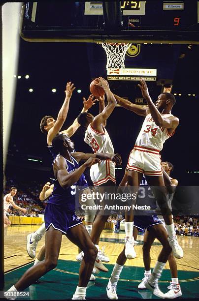 Tournament. Maryland Derrick Lewis & Len Bias in action, rebounding vs Villanova.