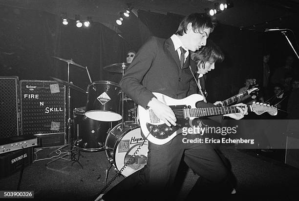 The Jam perform on stage at punk club The Roxy, Covent Garden, London, 24th February 1977. L-R Rick Buckler , Paul Weller, Bruce Foxton.