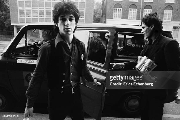 Johnny Thunders and the Heartbreakers with a Ford Transit tour van, St Albans, United Kingdom, 1977.