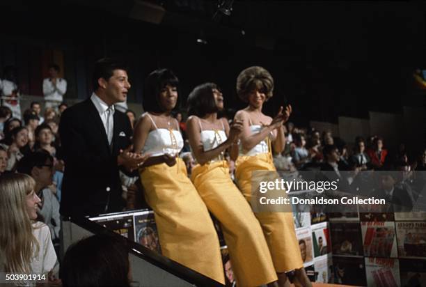 Host Frankie Avalon joins singers, Mary Wilson, Florence Ballard and Diana Ross of the R and B Group 'The Supremes' as they rehearse for their...