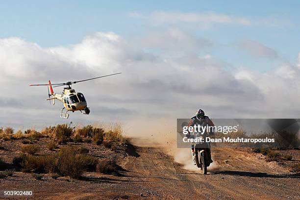 Antoine Meo of France riding on and for KTM 450 RALLY REPLICA RED BULL KTM FACTORY TEAM followed by the TV helicopter as he competes on day 5 from...