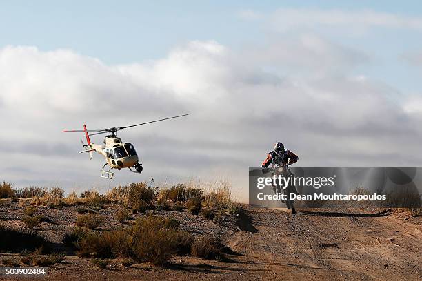 Antoine Meo of France riding on and for KTM 450 RALLY REPLICA RED BULL KTM FACTORY TEAM followed by the TV helicopter as he competes on day 5 from...