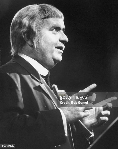 Bob Keeshan directing orchestra during his concert show.