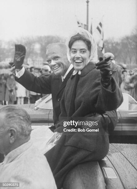 American astronaut John H. Glenn Jr. And his wife Annie ride with American Vice President Lyndon Baines Johnson during a parade in Glenn's honor in...