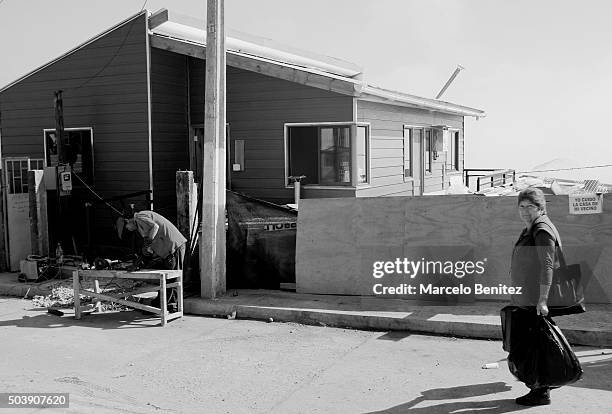 Marcela Quintana a 57 year old hair dresser poses for pictures at Cerro Merced on October 29, 2015 in Valparaiso, Chile. Marcela Quintana lost her...