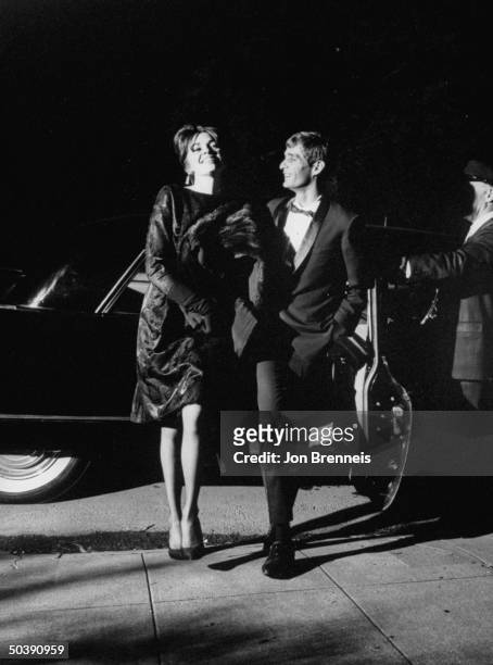 American actress Jeri Elam , arriving at the film festival with an escort.