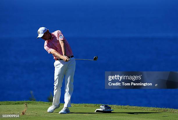 Brandt Snedeker plays his shot from the 13th tee during round one of the Hyundai Tournament of Champions at the Plantation Course at Kapalua Golf...