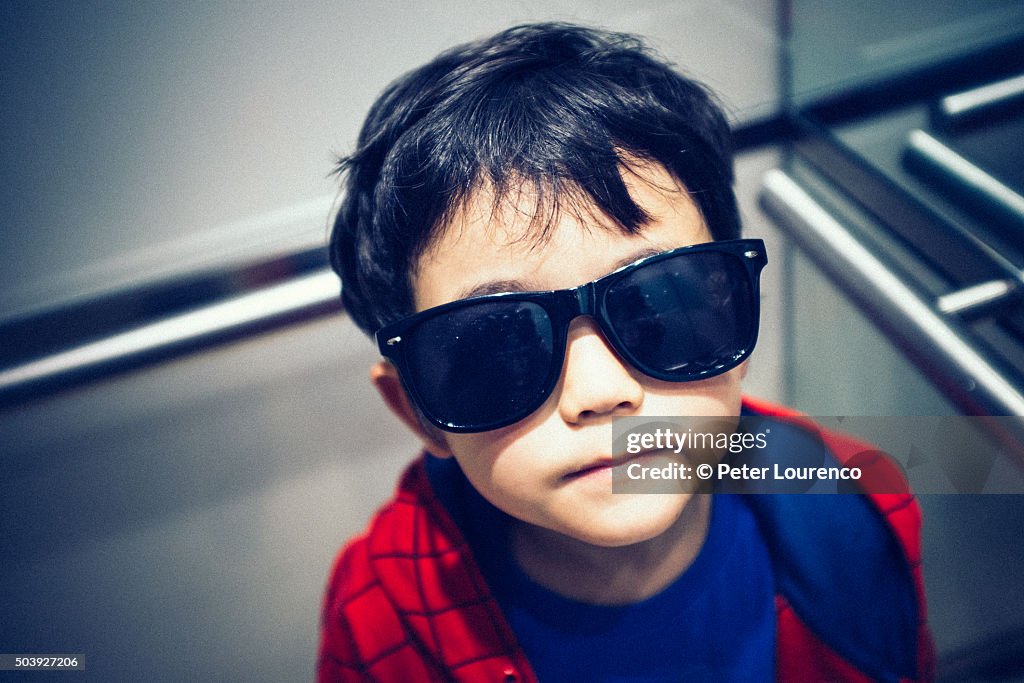 Young boy wearing sunglasses