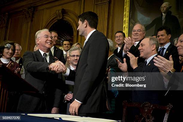 House Speaker Paul Ryan, a Republican from Wisconsin, center, shakes hands with Representative Thomas "Tom" Price, a Republican from Georgia and...