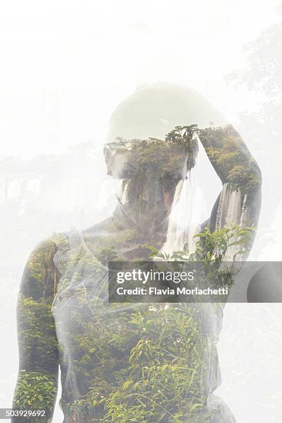 double exposure of a young woman and iguazú waterfalls - double facepalm stock pictures, royalty-free photos & images