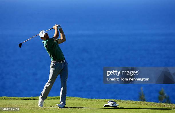 Jordan Spieth plays his shot from the 13th tee during round one of the Hyundai Tournament of Champions at the Plantation Course at Kapalua Golf Club...