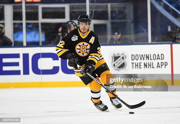 Don Sweeney of the Boston Bruins Alumni Team controls the puck during the Alumni Game as part of the 2016 Bridgestone NHL Classic at Gillette Stadium...