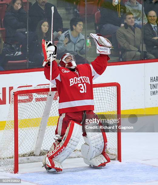 Sean Maguire of the Boston University Terriers celebrates a 6-5 victory against the Harvard Crimson during NCAA hockey at The Bright-Landry Hockey...