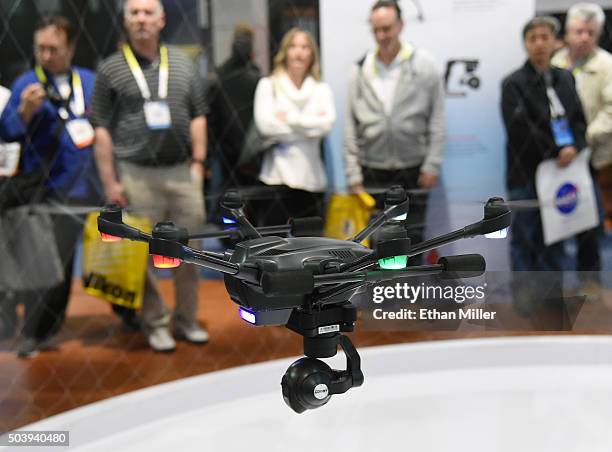 Yuneec Typhoon H drone is flown at CES 2016 at the Las Vegas Convention Center on January 7, 2016 in Las Vegas, Nevada. The USD 1,799 drone features...