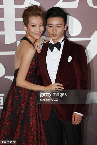 Actress Ada Choi and husband Max Zhang arrive at the red carpet of the 2015 Sina Weibo Award Ceremony at China World Trade Center Tower III on...