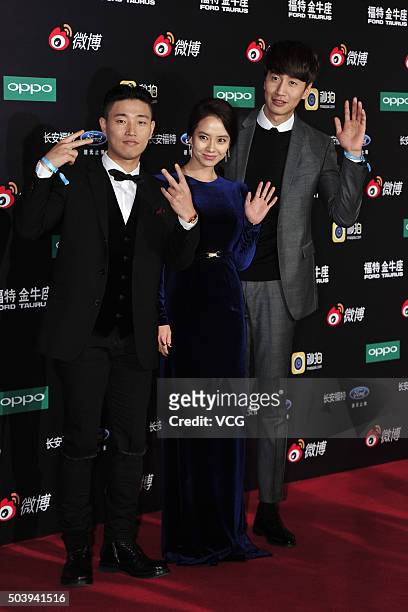 South Korea singer and host Gary, actress and hostess Song Ji Hyo, and model and actor Lee Kwang Soo arrive at the red carpet of the 2015 Sina Weibo...