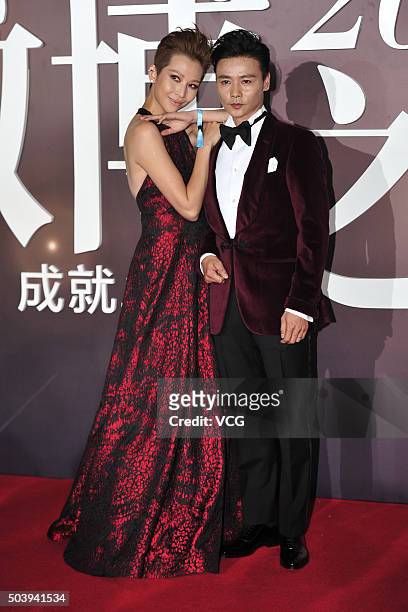 Actress Ada Choi and husband Max Zhang arrive at the red carpet of the 2015 Sina Weibo Award Ceremony at China World Trade Center Tower III on...