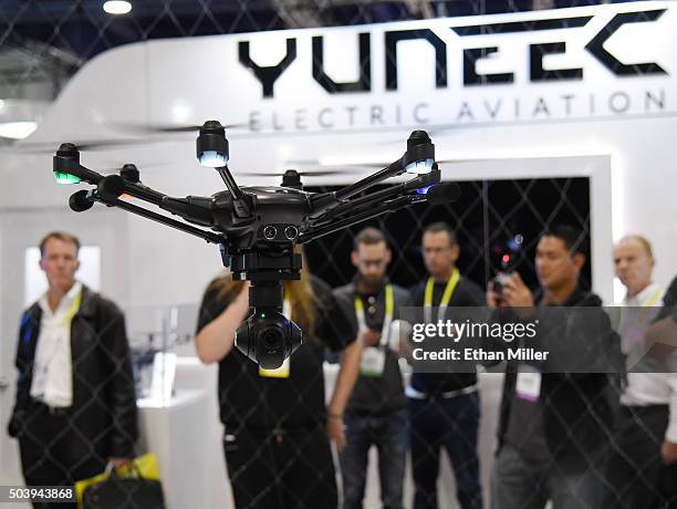 Yuneec Typhoon H drone is flown at CES 2016 at the Las Vegas Convention Center on January 7, 2016 in Las Vegas, Nevada. The USD 1,799 drone features...