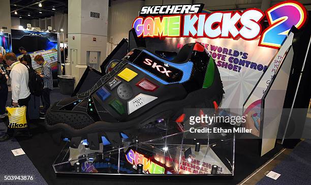 An oversized version of Sketchers Game Kicks 2, the word's first remote control game shoe, is displayed at CES 2016 at the Las Vegas Convention...