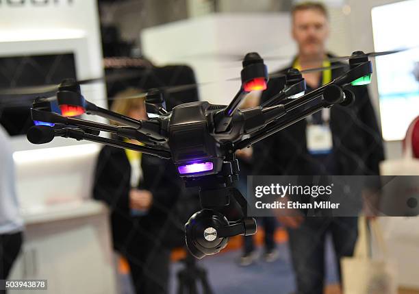 Yuneec Typhoon H drone is flown at CES 2016 at the Las Vegas Convention Center on January 7, 2016 in Las Vegas, Nevada. The USD 1,799 drone features...