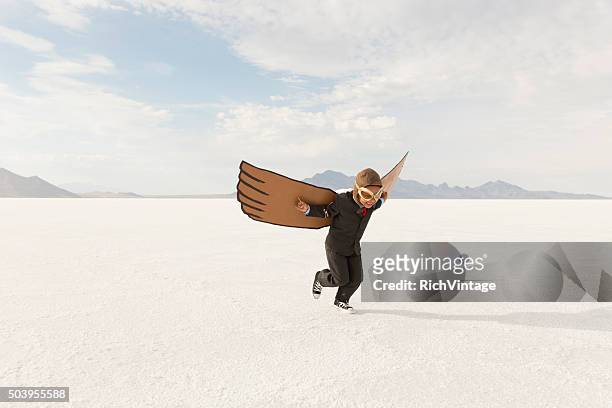 young boy businessman is flying away - animal wing bildbanksfoton och bilder