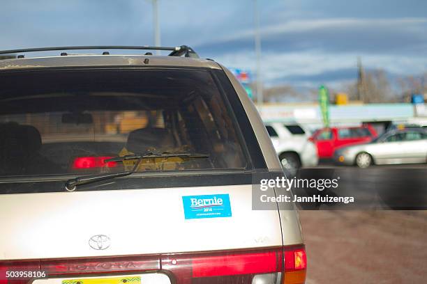 "bernie 2016" sticker on car at intersection - bumper sticker stock pictures, royalty-free photos & images