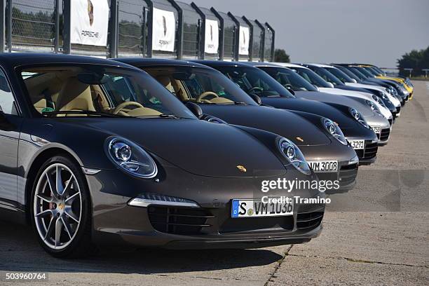 porsche 911 in a row - porsche stock pictures, royalty-free photos & images