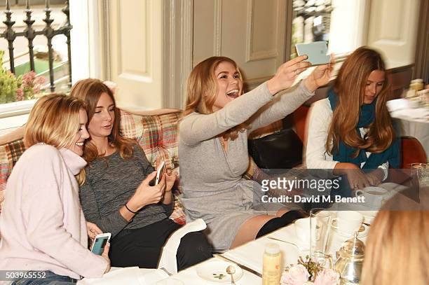 Caggie Dunlop, Millie Mackintosh, Madeleine Shaw and Irene Forte attend the Madeleine Shaw Glow Guides app launch at Brown's Hotel in partnership...