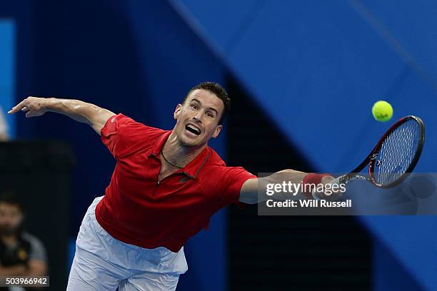 Kenny De Schepper of France plays a forehand in the men's single match against Nick Krygios of Australia Green during day six of the 2016 Hopman Cup...