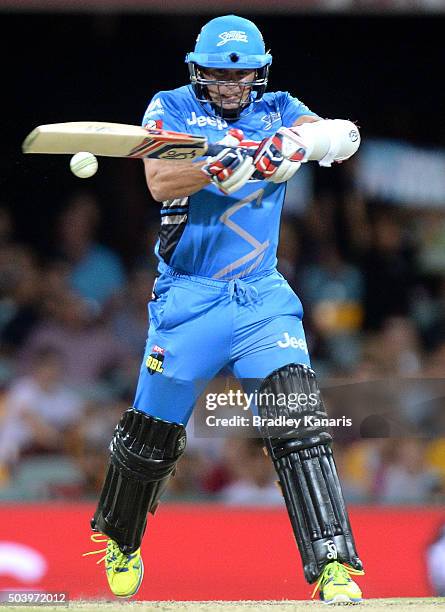 Brad Hodge of the Strikers plays a shot during the Big Bash League match between the Brisbane Heat and the Adelaide Strikers at The Gabba on January...