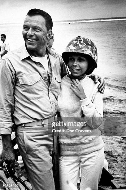 Nancy Sinatra with father, Frank Sinatra, during producing and directing of movie `None But The Brave.