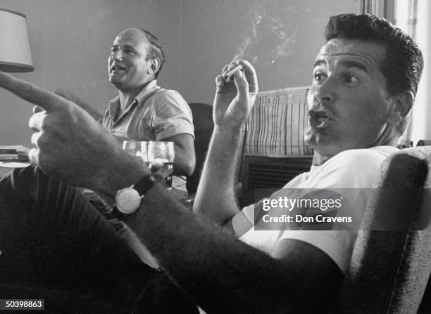 Actor, James Garner, sitting at gambling table.