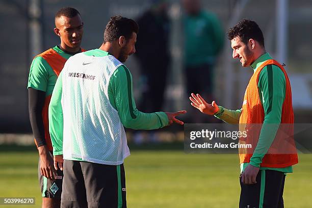 Claudio Pizarro and Levin Oeztunali play 'Stone paper Scissors' during a Werder Bremen training session on day 3 of the Bundesliga Belek training...