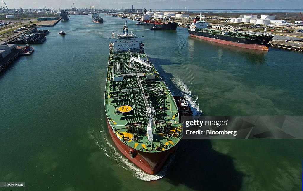 Views Of Tankers & Refineries As Oil Trades Near 12-Year Low