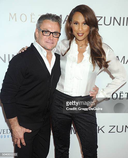 Mark Zunino and Beverly Johnson arrive at the Mark Zunino Atelier Opening at Mark Zunino Atelier on January 7, 2016 in Beverly Hills, California.