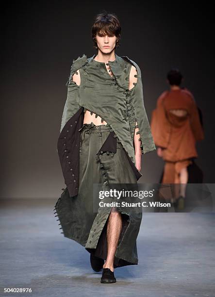 Model walks the runway at the Craig Green show during the London Collections Men AW16 at the Topman Show Space on January 8, 2016 in London, England.