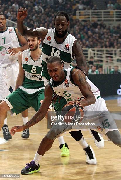Jamar Smith, #15 of Unicaja Malaga competes with James Gist, #14 of Panathinaikos Athens during the Turkish Airlines Euroleague Basketball Top 16...
