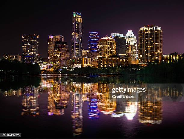 austin texas skyline cityscape reflection over ladybird lake at night - austin skyline stock pictures, royalty-free photos & images