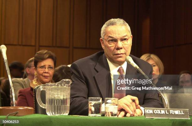 Retired General Colin Powell answering questions from US Senators during his confirmation hearings for the postion of US Secretary of State. His wife...