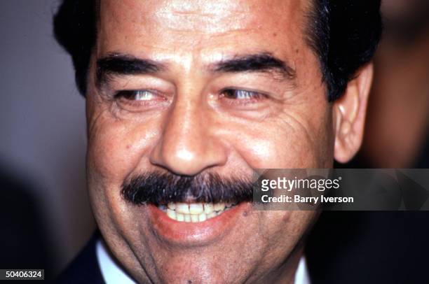 Close-up of Iraq leader Saddam Hussein during one-day visit to Cairo for talks with Egyptian President Hosni Mubarak.