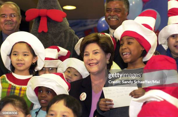 First Lady Laura Bush visiting a local Washington elementary school on what would have been the 98th birthday of Dr. Seuss, to promote the Read...