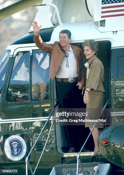 President and Mrs. Reagan departing the White House via Marine One from the South Lawn of the White House.