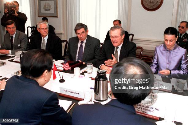 Secretary of Defense Donald H. Rumsfeld hosting a meeting w. Chinese Vice Premier Qian Qichen at the Pentagon. Among those participating in the talks...