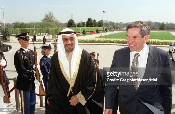 Kuwaiti Minister of State for Foreign Affairs Sheik Mohammed Sabah al-Salim al-Sabah being escorted through an honor cordon into the Pentagon by...