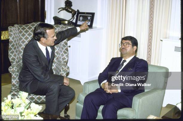 Vice President George H. W. Bush meeting with Turkish Prime Minister Turgut Ozal at White House.