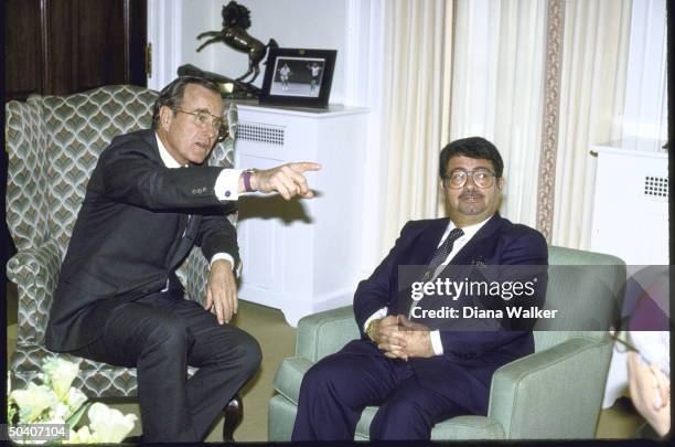 Vice President George H. W. Bush meeting with Turkish Prime Minister Turgut Ozal at White House.