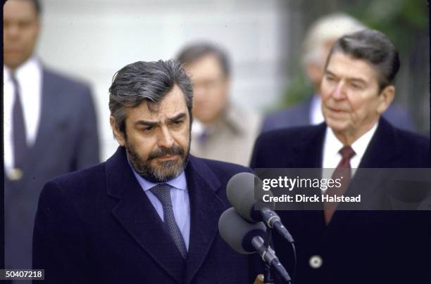 Italian Prime Minister speaking during a ceremony on the White House lawn as US President Ronald W. Reagan watches.