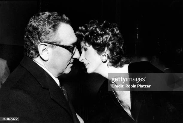 Former Secretary of State Henry Kissinger nuzzling w. Wife Nancy.
