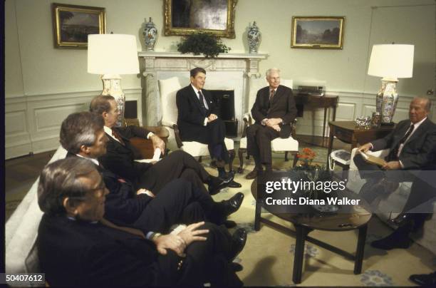 Cabinet meeting before Venice economic summit, in Oval Office, including Pres. Ronald W. Reagan sitting in white chair.